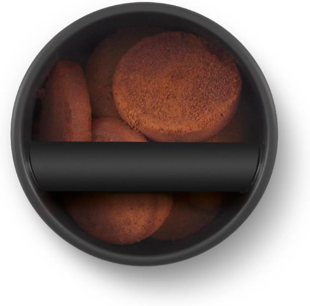The interior of the Breville Knock Box 10 showing its capacity for multiple pucks