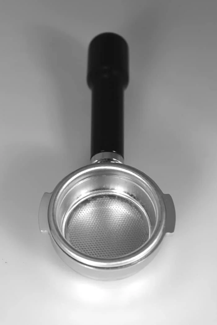Close-up of espresso extraction from a bottomless portafilter on a Rocket Espresso machine
